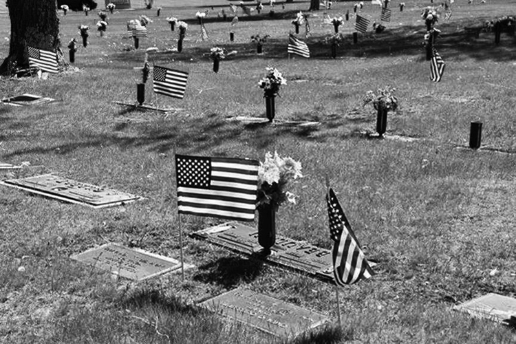 Record number of volunteers place flags on veterans’ graves for Memorial Day