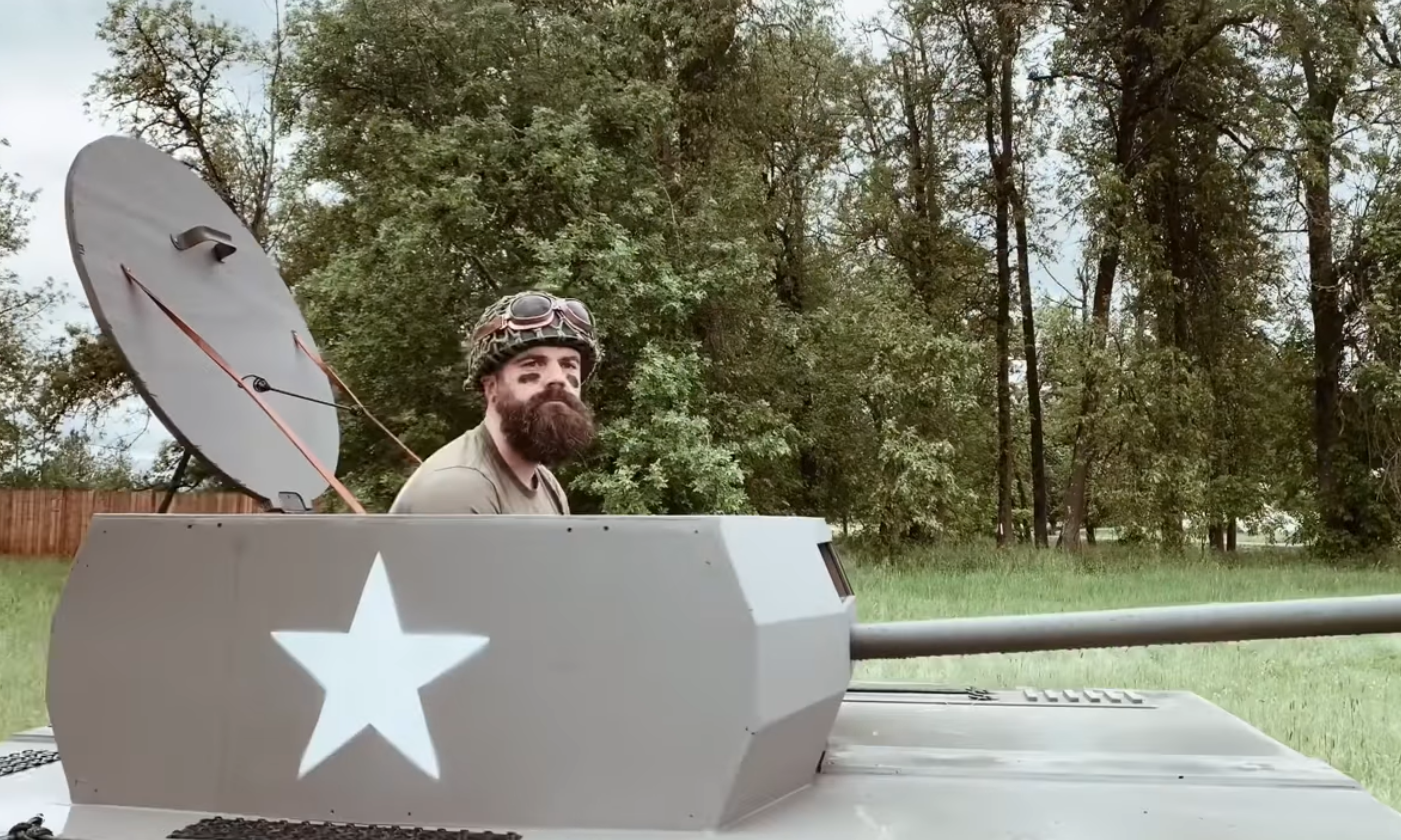 Video: Carpenter proves a tank can mow the lawn, too