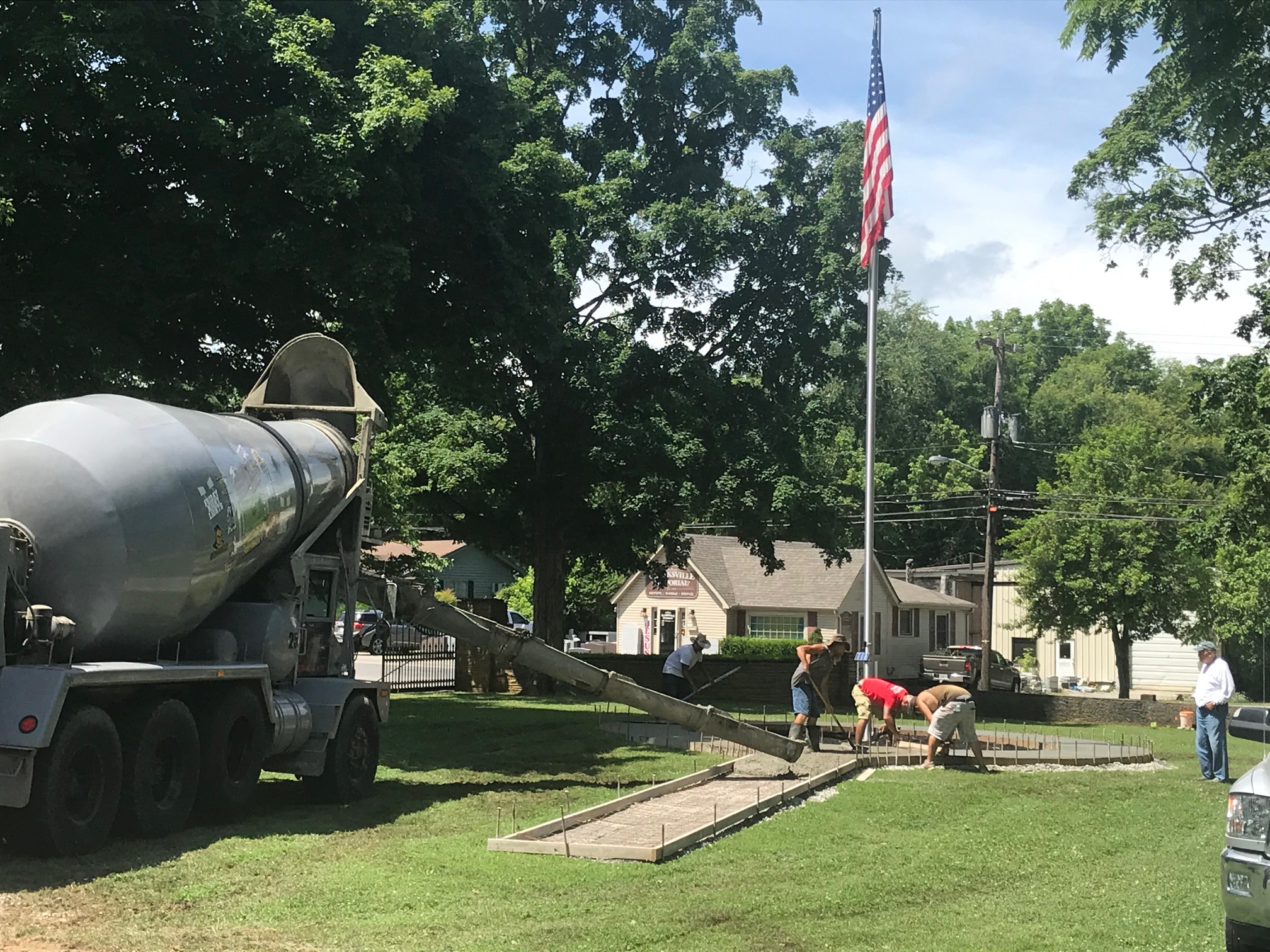 Huge flagpole installed in honor of decorated veterans thanks to one generous trucking company